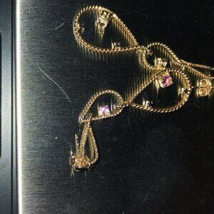 14k solid gold dangling earrings with tourmaline and sqpphires